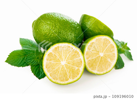 Half of lime citrus fruit. Lime cut isolated on white 109196010