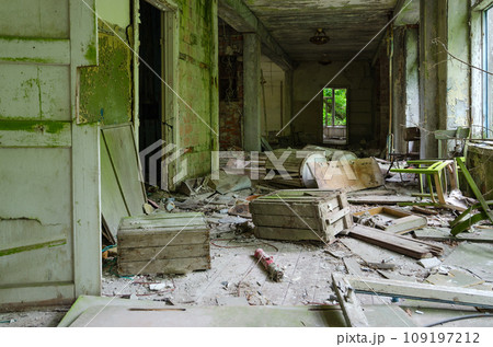 Devastation in corridor of abandoned school in resettled village of Pogonnoye in exclusion zone of Chernobyl nuclear power plant, Belarus 109197212