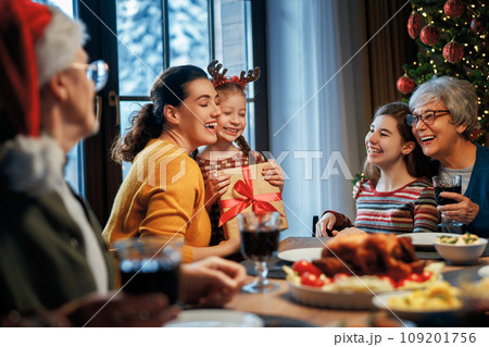 family celebrating Christmas family celebrating Christmas 109201756