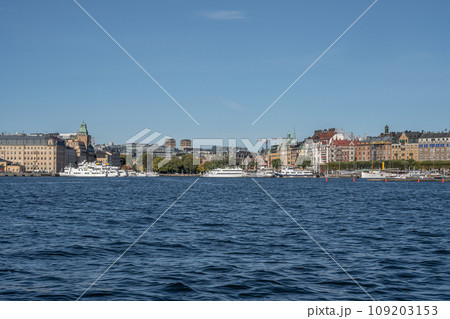 Scenic summer panorama of the Old Town Gamla Stan pier architecture in Stockholm, Sweden 109203153