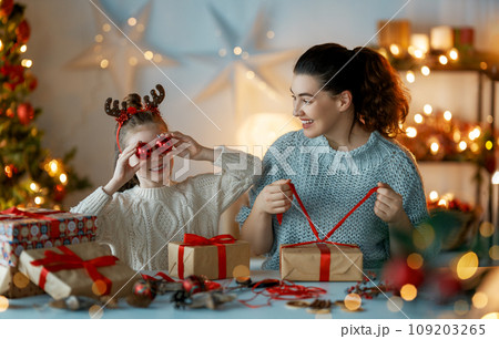 family preparing for Christmas family preparing for Christmas 109203265