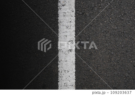 Close-up view of the black asphalt Close-up view of the black asphalt 109203637