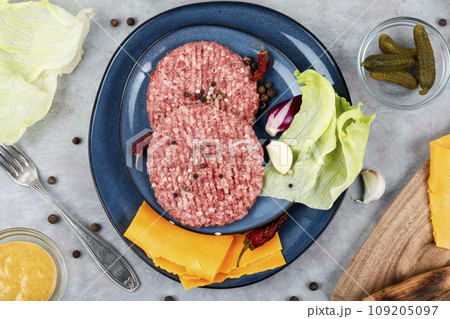 Raw burger cutlets Raw burger cutlets 109205097