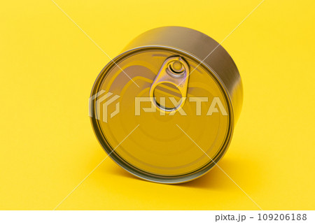 Unopened Tin Can with Blank Edge on Yellow Background 109206188