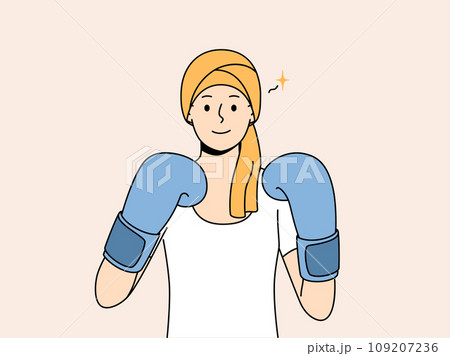 Woman with cancer in boxing gloves symbolizes fight against oncology after chemotherapy 109207236