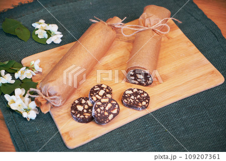 Beautiful chocolate salami on the table Beautiful chocolate salami on the table 109207361
