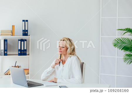 woman secretary working with laptop computer in office woman secretary working with laptop computer in office 109208160