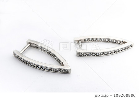 Luxury silver round earrings big jewelry for women isolated on white background, clipping path included 109208986