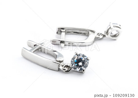 Luxury silver round earrings big jewelry for women isolated on white background, clipping path included Luxury silver round earrings big jewelry for women isolated on white background, clipping path included 109209130