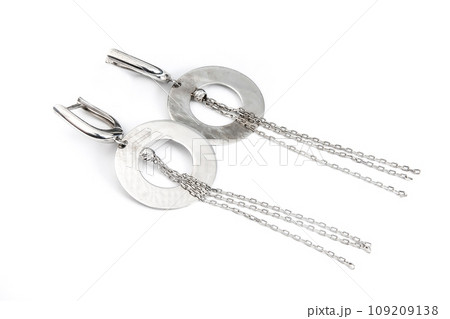 Luxury silver round earrings big jewelry for women isolated on white background, clipping path included Luxury silver round earrings big jewelry for women isolated on white background, clipping path included 109209138