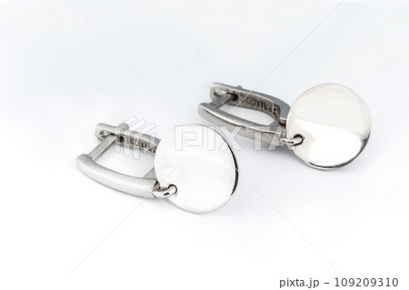 Luxury silver round earrings big jewelry for women isolated on white background, clipping path included 109209310