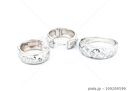 Silver jewels collection with crystals in minimalism style. Silver set of earrings and silver necklace Silver jewels collection with crystals in minimalism style. Silver set of earrings and silver necklace 109209599