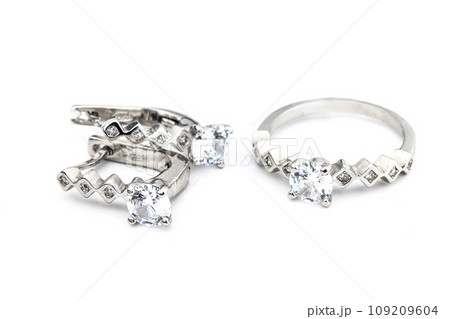 Silver jewels collection with crystals in minimalism style. Silver set of earrings and silver necklace 109209604