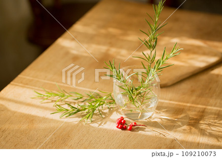 Rosemary and lemongrass berries. Decorations for Christmas dishes Rosemary and lemongrass berries. Decorations for Christmas dishes 109210073