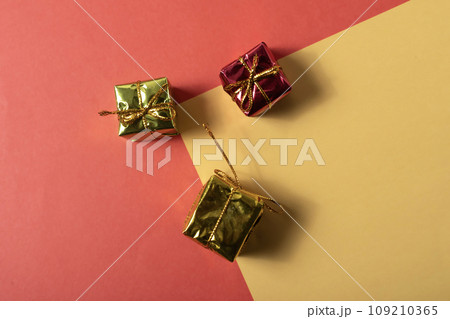Christmas gift boxes on colorful background. Top view with copy space. Christmas gift boxes on colorful background. Top view with copy space. 109210365