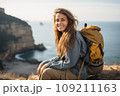 Beautiful young woman on a beach with backpack 109211163