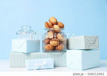 Cookies Nuts in a glass jar with gifts 109212061