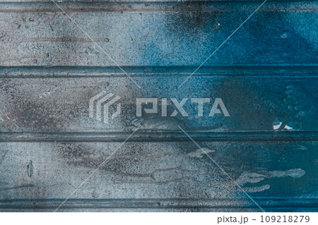 Blue paint spot stain old dirty fence surface weathered texture background pattern Blue paint spot stain old dirty fence surface weathered texture background pattern 109218279