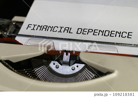 The text is printed on a typewriter - financial dependence 109218381