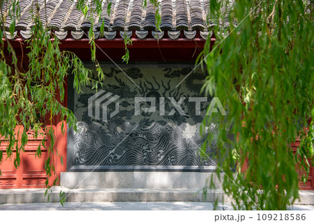 Japanese stone panel with dragons in the park Japanese stone panel with dragons in the park 109218586