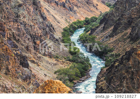 The Charyn River, in the gorge that flows through the Charyn Canyon in Kazakhstan in the Almaty region 109218827