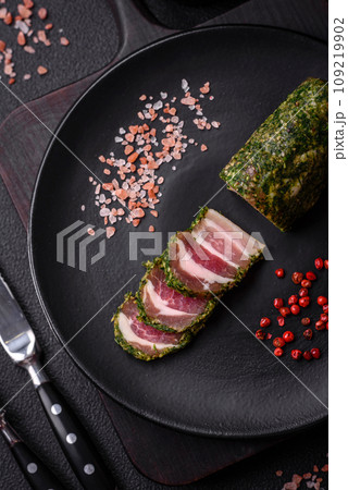 Delicious fresh bacon stripes with spices and salt Delicious fresh bacon stripes with spices and salt 109219902