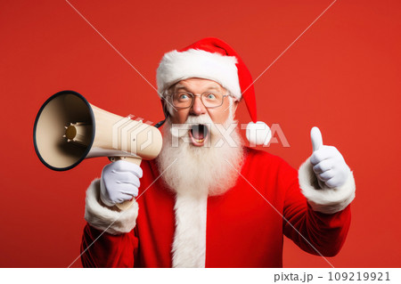 Santa Claus with megaphone on red background. 109219921
