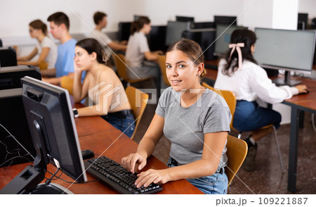 Woman learning to use software in computer class Woman learning to use software in computer class 109221887