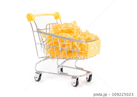 Uncooked Fusilli Pasta in Small Shopping Cart Isolated on White 109225023