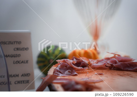 A vibrant and colorful plate of food sits on a rustic wooden table. The simple and straightforward presentation showcases a variety of fresh and delicious ingredients. A vibrant and colorful plate of food sits on a rustic wooden table. The simple and straightforward presentation showcases a variety of fresh and delicious ingredients. 109226590