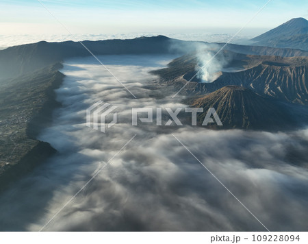 Aerial view Mountains at Bromo volcano during sunrise sky,Beautiful Mountains Penanjakan in Bromo Tengger Semeru National Park,East Java,Indonesia.Nature landscape background 109228094