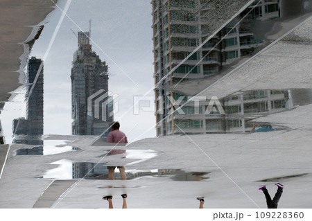 Blurry reflection shadow of building Blurry reflection shadow of building 109228360