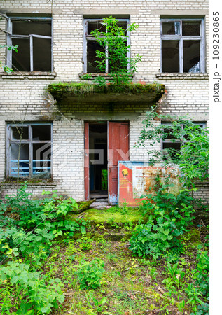 Stand with socialist slogan at entrance to abandoned building of former village council in resettled village of Pogonnoye in Chernobyl exclusion zone, Belarus Stand with socialist slogan at entrance to abandoned building of former village council in resettled village of Pogonnoye in Chernobyl exclusion zone, Belarus 109230865