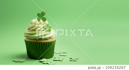 St Patrick's day concept - cupcake with shamrock topper 109238267