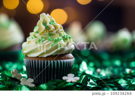 St Patrick's day concept - cupcake with shamrock topper 109238268