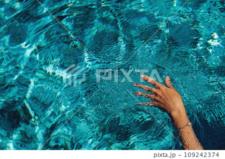 Swimming in a pool. Summer holidays concept. Swimming in a pool. Summer holidays concept. 109242374