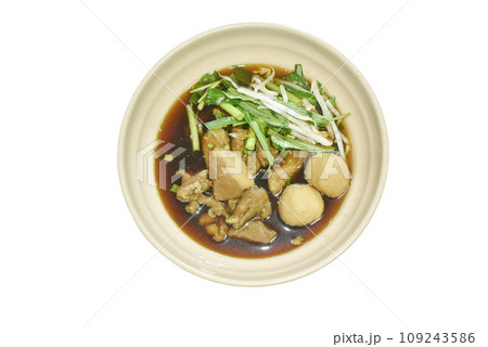 braised pork tendon and meatball with bean sprout in brown soup on bowl  109243586