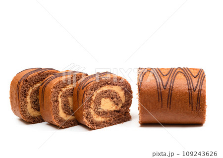 Sliced sponge roll with chocolate filling on a white background 109243626