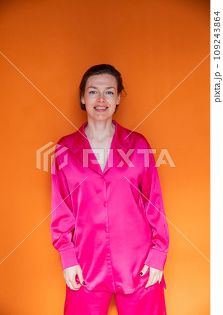 Beautiful fashionable woman in crimson silk pajamas 109243864