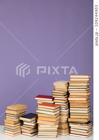 Lots of stacks of educational books to read as a background 109244903