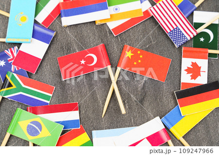 The concept is diplomacy. In the middle among the various flags are two flags - China, Turkey The concept is diplomacy. In the middle among the various flags are two flags - China, Turkey 109247966