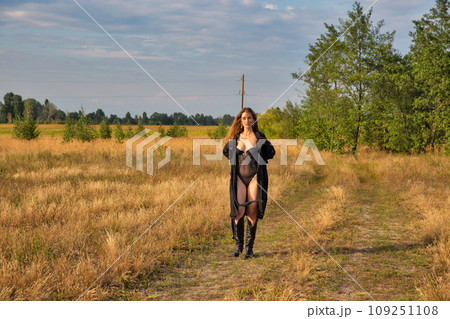 Beautiful caucasian woman in black bodysuit 109251108