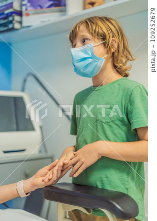 a pregnant mother's ultrasound visit, sharing the excitement with her son who eagerly awaits the arrival of his baby brother. A heartwarming portrayal of family bonds and the anticipation of new a pregnant mother's ultrasound visit, sharing the excitement with her son who eagerly awaits the arrival of his baby brother. A heartwarming portrayal of family bonds and the anticipation of new 109252679