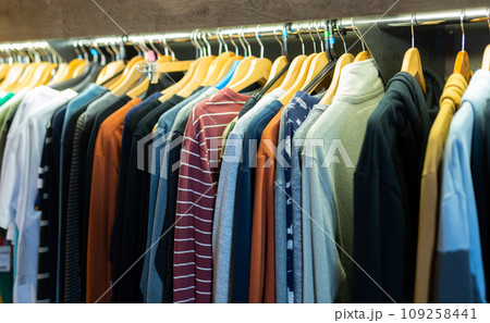 Assortment of summer clothing in modern store 109258441