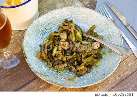 Portion of lechecillas de ternasco served on table 109258581