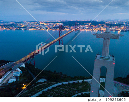 Illuminated Lisbon and 25th April Bridge 109258606
