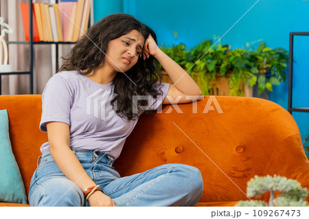 Indian woman at home suffers from unfair situation problem, break up, depressed, feeling bad burnout 109267473