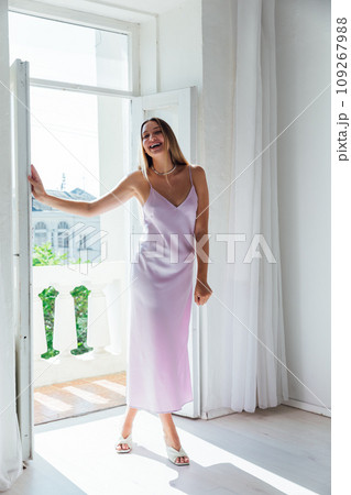 Portrait of a beautiful blonde woman in a dress Portrait of a beautiful blonde woman in a dress 109267988