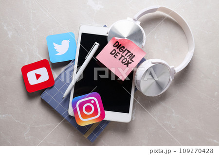 Digital detox concept, smartphone with social network icons Digital detox concept, smartphone with social network icons 109270428