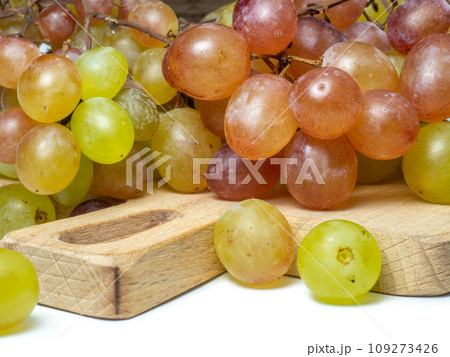 Grapes on a white background. berries for wine. Berry isolate. Sweet grapes kishmish. 109273426